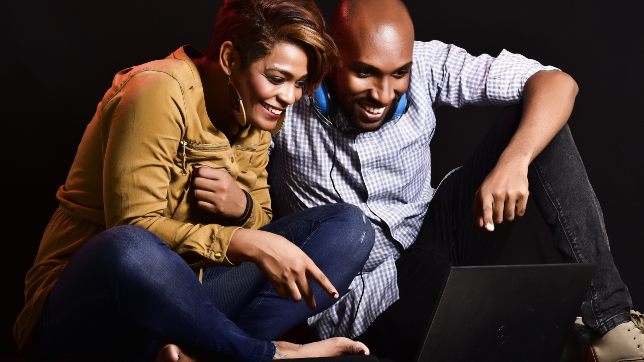 Man and woman learning from laptop